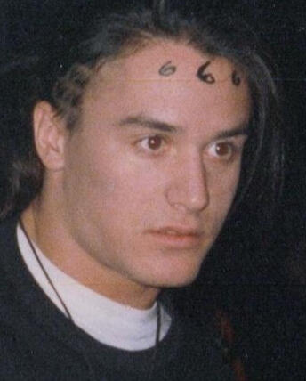 mike patton with the number 666 on his forehead